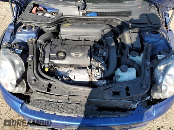 ✅ 2012 MINI Hardtop S • VIN: WMWSV3C5XCTY16779 • Lot: 89801015. Wystawiony na Copart z przebiegiem 128 122 mil. Bezpłatny archiwum sprzedaży aukcyjnych z USA i szczegółowy raport historii pojazdu na DreamBid. Zdjęcie 11.