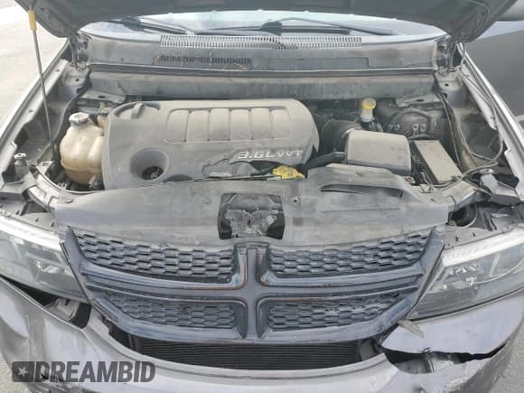 ✅ 2015 Dodge Journey Crossroad • VIN: 3C4PDCGGXFT687085 • Lot: 91206575. Listed on Copart with 109,502 mi. Free auction sales archive from the USA and detailed vehicle history report at DreamBid. Image 12.