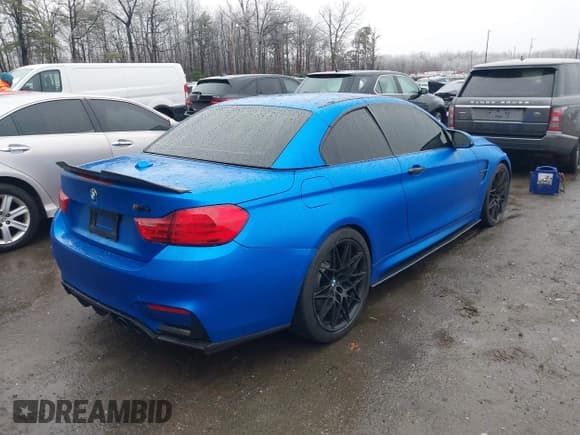 ✅ 2015 BMW M4 • VIN: WBS3U9C5XFJ968082 • Lot: 41513593. Listed on IAAI with 57,715 mi. Free auction sales archive from the USA and detailed vehicle history report at DreamBid. Image 4.
