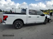 ✅ 2023 Ford F-150 Lightning Lariat • VIN: 1FTVW1EL0PWG34526 • Lot: 86102905. Listed on Copart with 35,559 mi. Free auction sales archive from the USA and detailed vehicle history report at DreamBid. Image 3.