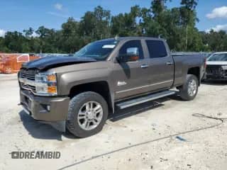 2015 Chevrolet Silverado 2500HD High Country с VIN 1GC1KXE83FF662442, выставлен на аукционе Copart как лот 67191205 с пробегом 77 046 миль миль и Списание • Salvage title. История ставок и продаж доступна на DreamBid. Изображение 1.
