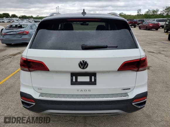 ✅ 2023 Volkswagen Taos SE • VIN: 3VVVX7B28PM382828 • Лот: 57849455. Опубликован ранее на Copart с пробегом 7 920 миль. Бесплатный доступ к архиву аукционных продаж из США и подробный отчёт об истории автомобиля на DreamBid. Изображение 6.