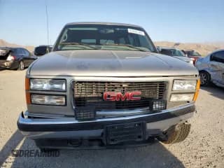 ✅ 1999 GMC Suburban • VIN: 3GKFK16R4XG547136 • Lot: 67082184. Wystawiony na Copart z przebiegiem 264 712 mil. Bezpłatny archiwum sprzedaży aukcyjnych z USA i szczegółowy raport historii pojazdu na DreamBid. Zdjęcie 5.