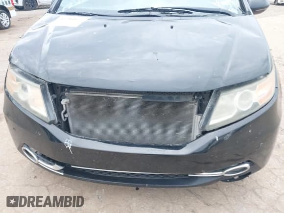 ✅ 2014 Honda Odyssey Touring • VIN: 5FNRL5H99EB005835 • Lot: 43210547. Listed on IAAI with 224,342 mi. Free auction sales archive from the USA and detailed vehicle history report at DreamBid. Image 6.