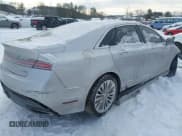 ✅ 2014 Lincoln MKZ • VIN: 3LN6L2J92ER832064 • Lot: 41374046. Listed on IAAI with 84,000 mi. Free auction sales archive from the USA and detailed vehicle history report at DreamBid. Image 4.