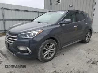 ✅ 2017 Hyundai Santa Fe 2.0T • VIN: 5XYZUDLA1HG495970 • Lot: 92159705. Listed on Copart with 68,332 mi. Free auction sales archive from the USA and detailed vehicle history report at DreamBid. Image 1.