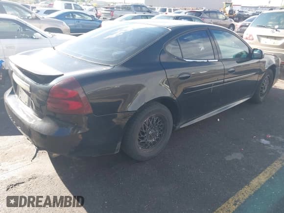✅ 2005 Pontiac Grand Prix • VIN: 2G2WP522251184309 • Lot: 43450979. Listed on IAAI with 210,851 mi. Free auction sales archive from the USA and detailed vehicle history report at DreamBid. Image 4.