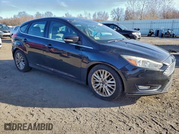✅ 2015 Ford Focus Titanium • VIN: 1FADP3N27FL235033 • Lot: 95573645. Wystawiony na Copart z przebiegiem 158 138 mil. Bezpłatny archiwum sprzedaży aukcyjnych z USA i szczegółowy raport historii pojazdu na DreamBid. Zdjęcie 4.