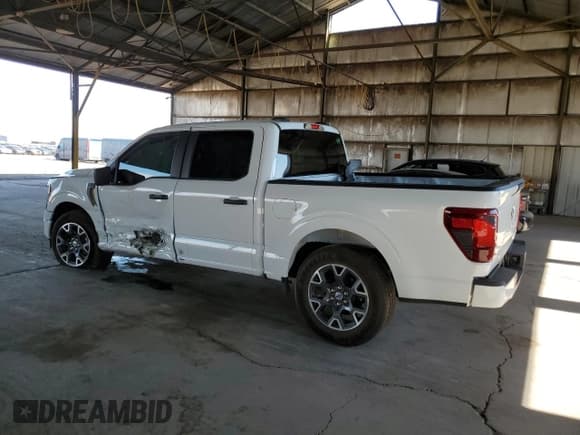 ✅ 2024 Ford F-150 STX • VIN: 1FTEW2K59RKD28303 • Lot: 69599485. Listed on Copart with 5,859 mi. Free auction sales archive from the USA and detailed vehicle history report at DreamBid. Image 2.