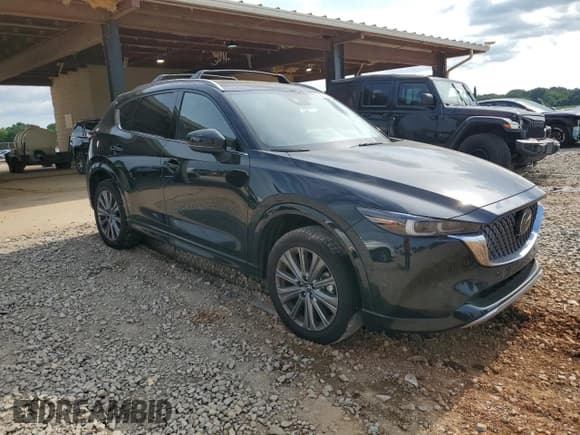 ✅ 2024 Mazda CX-5 Signature • VIN: JM3KFBXYXR0429715 • Lot: 62572165. Listed on Copart with 6,056 mi. Free auction sales archive from the USA and detailed vehicle history report at DreamBid. Image 4.