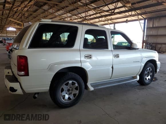 ✅ 2003 Cadillac Escalade • VIN: 1GYEK63N03R145754 • Lot: 82171295. Wystawiony na Copart z przebiegiem 186 302 mil. Bezpłatny archiwum sprzedaży aukcyjnych z USA i szczegółowy raport historii pojazdu na DreamBid. Zdjęcie 3.