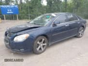 ✅ 2012 Chevrolet Malibu 1LT • VIN: 1G1ZC5E0XCF322563 • Lot: 39727617. Listed on IAAI with 129,179 mi. Free auction sales archive from the USA and detailed vehicle history report at DreamBid. Image 2.