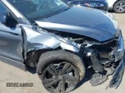 ✅ 2024 Volkswagen Tiguan SE R-Line Black • VIN: 3VVCB7AX2RM010794 • Lot: 41894596. Wystawiony na IAAI z przebiegiem 25 136 mil. Bezpłatny archiwum sprzedaży aukcyjnych z USA i szczegółowy raport historii pojazdu na DreamBid. Zdjęcie 17.