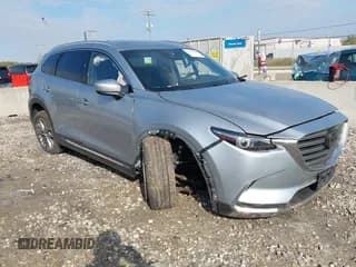 ✅ 2021 Mazda CX-9 Grand Touring • VIN: JM3TCADY6M0517827 • Лот: 43436121. Опубликован ранее на IAAI с пробегом 149 538 миль. Бесплатный доступ к архиву аукционных продаж из США и подробный отчёт об истории автомобиля на DreamBid. Изображение 1.