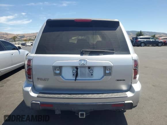 2006 Honda Pilot LX with VIN 2HKYF18136H556660, listed as a Copart auction lot 67755065 with 122,936 mi miles and Salvage title. Bid and sale history available at DreamBid. Image 6.