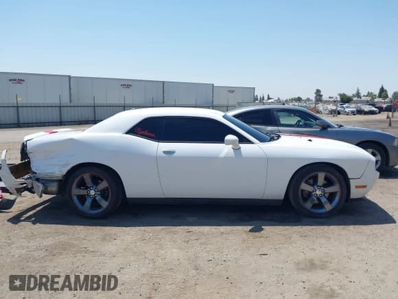✅ 2012 Dodge Challenger SXT • VIN: 2C3CDYAG5CH315201 • Lot: 42966307. Wystawiony na IAAI z przebiegiem 107 154 mil. Bezpłatny archiwum sprzedaży aukcyjnych z USA i szczegółowy raport historii pojazdu na DreamBid. Zdjęcie 13.