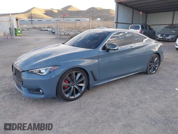 ✅ 2021 Infiniti Q60 Red Sport 400 • VIN: JN1FV7LK1MM530240 • Лот: 43687803. Опубликован ранее на IAAI с пробегом 84 141 миль. Бесплатный доступ к архиву аукционных продаж из США и подробный отчёт об истории автомобиля на DreamBid. Изображение 2.