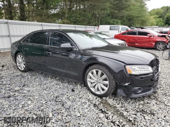 ✅ 2016 Audi A8 Sport • VIN: WAU43AFD2GN005719 • Лот: 60746275. Опубликован ранее на Copart с пробегом 125 802 миль. Бесплатный доступ к архиву аукционных продаж из США и подробный отчёт об истории автомобиля на DreamBid. Изображение 4.