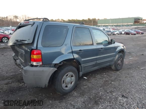 ✅ 2005 Ford Escape XLS Value • VIN: 1FMYU02Z25KB63243 • Lot: 43837346. Listed on IAAI with 162,313 mi. Free auction sales archive from the USA and detailed vehicle history report at DreamBid. Image 4.