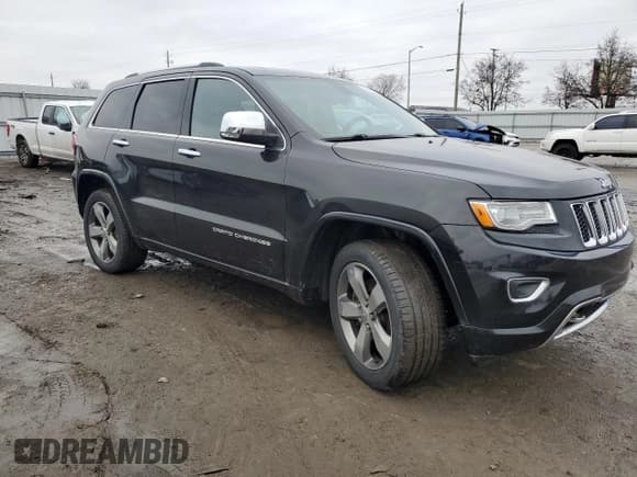✅ 2015 Jeep Grand Cherokee Overland • VIN: 1C4RJFCM5FC847707 • Lot: 86420784. Listed on Copart with 124,300 mi. Free auction sales archive from the USA and detailed vehicle history report at DreamBid. Image 4.