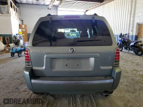 2006 Mercury Mariner Convenience with VIN 4M2YU56Z96DJ03164, listed as a Copart auction lot 69500635 with 212,923 mi miles and Salvage title. Bid and sale history available at DreamBid. Image 6.