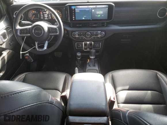 ✅ 2024 Jeep Wrangler Sahara • VIN: 1C4PJXEN9RW117093 • Lot: 56304875. Listed on Copart with 33,741 mi. Free auction sales archive from the USA and detailed vehicle history report at DreamBid. Image 8.