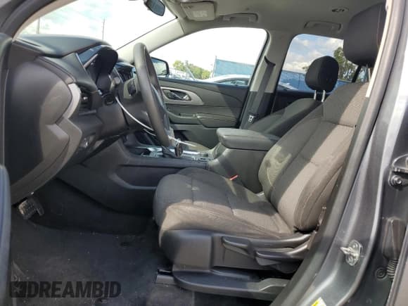 ✅ 2020 Chevrolet Traverse LS • VIN: 1GNERFKWXLJ174924 • Lot: 71939174. Wystawiony na Copart z przebiegiem 82 695 mil. Bezpłatny archiwum sprzedaży aukcyjnych z USA i szczegółowy raport historii pojazdu na DreamBid. Zdjęcie 7.