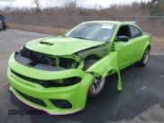 ✅ 2023 Dodge Charger Scat Pack Widebody • VIN: 2C3CDXGJ7PH591561 • Lot: 41466676. Listed on IAAI with 2,716 mi. Free auction sales archive from the USA and detailed vehicle history report at DreamBid. Image 2.