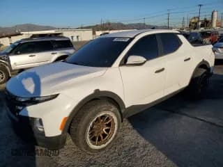 ✅ 2022 Hyundai Santa Cruz SEL • VIN: 5NTJBDAE5NH001866 • Lot: 90853285. Listed on Copart with 49,387 mi. Free auction sales archive from the USA and detailed vehicle history report at DreamBid. Image 1.