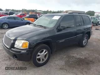 ✅ 2004 GMC Envoy SLE • VIN: 1GKDS13S542409267 • Lot: 43711865. Wystawiony na IAAI z przebiegiem 198 826 mil. Bezpłatny archiwum sprzedaży aukcyjnych z USA i szczegółowy raport historii pojazdu na DreamBid. Zdjęcie 2.