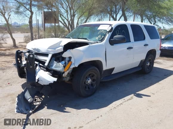 ✅ 2014 Chevrolet Tahoe Commercial • VIN: 1GNLC2E05ER210242 • Lot: 42818225. Wystawiony na IAAI z przebiegiem 161 337 mil. Bezpłatny archiwum sprzedaży aukcyjnych z USA i szczegółowy raport historii pojazdu na DreamBid. Zdjęcie 2.