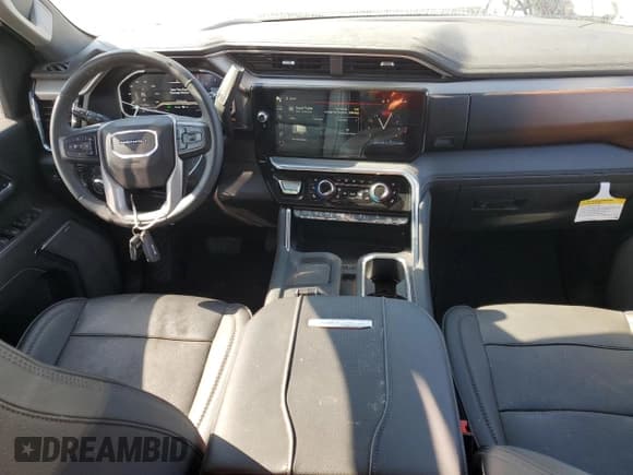 ✅ 2024 GMC Sierra 3500HD Denali • VIN: 1GT49WE70RF197195 • Лот: 80983364. Опубликован ранее на Copart с пробегом 12 195 миль. Бесплатный доступ к архиву аукционных продаж из США и подробный отчёт об истории автомобиля на DreamBid. Изображение 8.