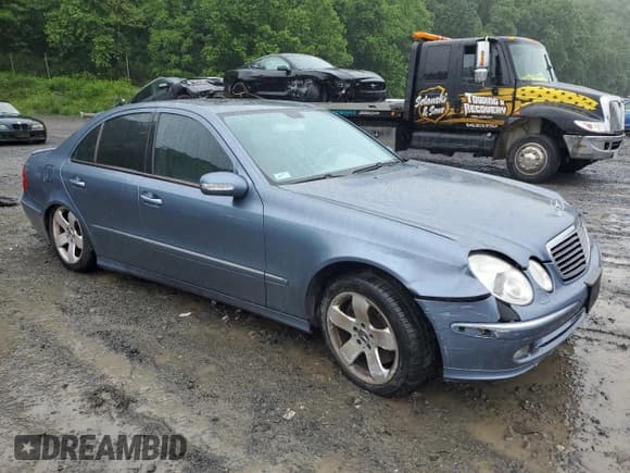✅ 2005 Mercedes-Benz E 500 • VIN: WDBUF83J35X172653 • Lot: 61388735. Listed on Copart with 163,088 mi. Free auction sales archive from the USA and detailed vehicle history report at DreamBid. Image 4.