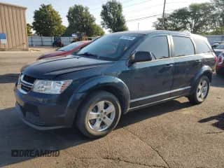 2013 Dodge Journey American Value with VIN 3C4PDCAB7DT567013, listed as a Copart auction lot 81016755 with 220,503 mi miles and Salvage title. Bid and sale history available at DreamBid. Image 1.