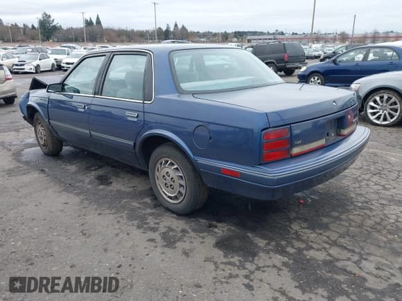 ✅ 1995 Oldsmobile Cutlass Ciera SL • VIN: 1G3AJ55M5S6348287 • Lot: 41615398. Wystawiony na IAAI z przebiegiem 103 201 mil. Bezpłatny archiwum sprzedaży aukcyjnych z USA i szczegółowy raport historii pojazdu na DreamBid. Zdjęcie 3.