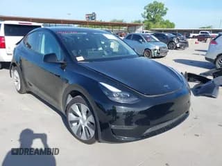 ✅ 2023 Tesla Model Y Long Range • VIN: 7SAYGAEE2PF632408 • Lot: 42601819. Listed on IAAI with 63,841 mi. Free auction sales archive from the USA and detailed vehicle history report at DreamBid. Image 1.