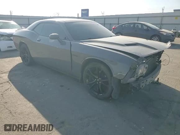 ✅ 2018 Dodge Challenger SXT • VIN: 2C3CDZAG9JH155102 • Лот: 81789595. Опубликован ранее на Copart с пробегом 105 554 миль. Бесплатный доступ к архиву аукционных продаж из США и подробный отчёт об истории автомобиля на DreamBid. Изображение 13.