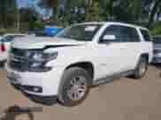 2015 Chevrolet Tahoe LT z VIN 1GNSKBKC3FR279459, wystawiony jako IAAI lot #43349972 z przebiegiem 112 043 mil mil oraz . Historia ofert i sprzedaży dostępna na DreamBid. Obrazek 2.