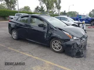 ✅ 2022 Toyota Prius L Eco • VIN: JTDKAMFU9N3155157 • Lot: 42367278. Listed on IAAI with 84,035 mi. Free auction sales archive from the USA and detailed vehicle history report at DreamBid. Image 1.