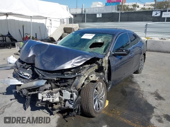 ✅ 2022 Honda Insight Touring • VIN: 19XZE4F92NE002174 • Lot: 43515550. Listed on IAAI with 9,677 mi. Free auction sales archive from the USA and detailed vehicle history report at DreamBid. Image 2.