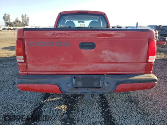 1999 Dodge Dakota SLT z VIN 1B7GL22Y9XS247522, wystawiony jako Copart lot #86311215 z przebiegiem 63 002 mil mil oraz Czysty tytuł • Clean title. Historia ofert i sprzedaży dostępna na DreamBid. Obrazek 6.