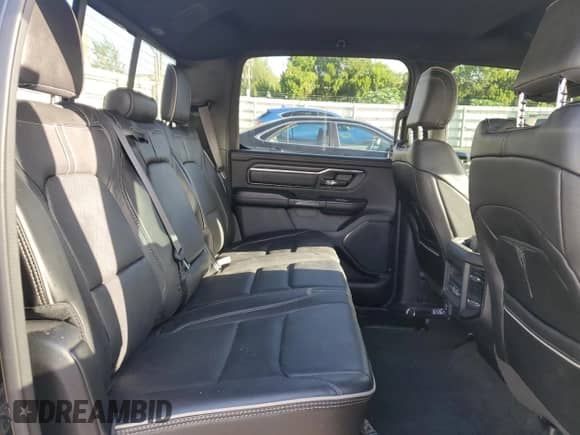 2023 Ram 1500 Limited with VIN 1C6SRFHT7PN533984, listed as a Copart auction lot 81782925 with 56,080 mi miles and Non repairable. Bid and sale history available at DreamBid. Image 10.