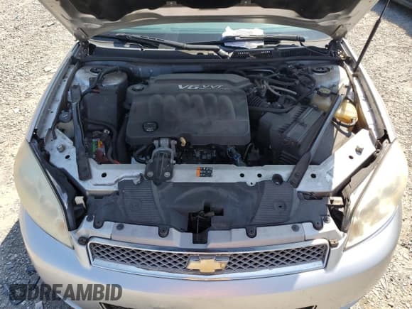 ✅ 2014 Chevrolet Impala LT • VIN: 2G1WB5E39E1107475 • Лот: 68021884. Опубликован ранее на Copart с пробегом 160 745 миль. Бесплатный доступ к архиву аукционных продаж из США и подробный отчёт об истории автомобиля на DreamBid. Изображение 11.