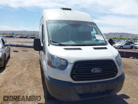 ✅ 2015 Ford Transit Cargo • VIN: 1FTNR3XM1FKA29218 • Lot: 43013185. Listed on IAAI with 740,683 mi. Free auction sales archive from the USA and detailed vehicle history report at DreamBid. Image 1.
