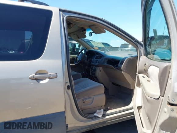 ✅ 2003 Toyota Sienna CE • VIN: 4T3ZF19C33U550009 • Lot: 43117707. Listed on IAAI with 195,555 mi. Free auction sales archive from the USA and detailed vehicle history report at DreamBid. Image 5.