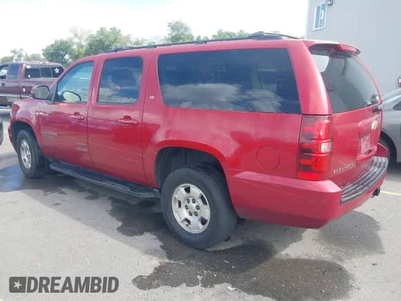 2013 Chevrolet Suburban LT z VIN 1GNSKJE77DR205791, wystawiony jako IAAI lot #43091004 z przebiegiem 184 633 mil mil oraz . Historia ofert i sprzedaży dostępna na DreamBid. Obrazek 3.