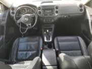 ✅ 2012 Volkswagen Tiguan S • VIN: WVGBV7AX6CW562562 • Lot: 87060975. Listed on Copart with 179,456 mi. Free auction sales archive from the USA and detailed vehicle history report at DreamBid. Image 8.