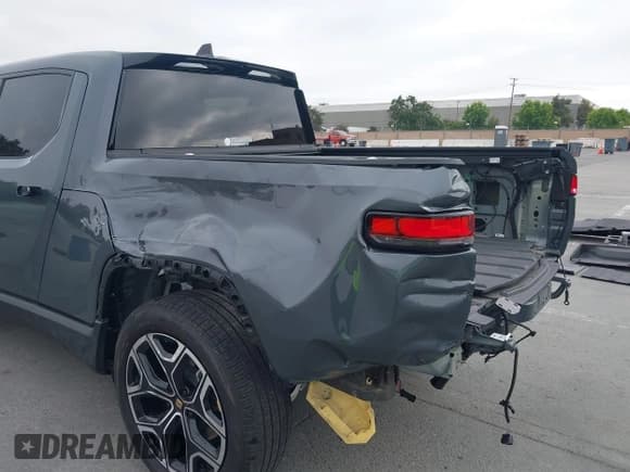 ✅ 2023 Rivian R1T Adventure • VIN: 7FCTGBAA5PN027763 • Lot: 42618685. Listed on IAAI with 21,985 mi. Free auction sales archive from the USA and detailed vehicle history report at DreamBid. Image 6.
