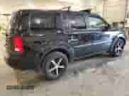 2010 Honda Pilot LX with VIN 5FNYF4H26AB031724, listed as a Copart auction lot 64199905 with 205,743 mi miles and Salvage title. Bid and sale history available at DreamBid. Image 3.