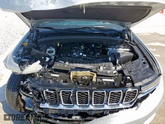 2022 Jeep Grand Cherokee Limited with VIN 1C4RJGBG1N8570458, listed as a Copart auction lot 52026855 with 16,134 mi miles and Salvage title. Bid and sale history available at DreamBid. Image 12.